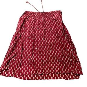 Burgundy ankle length skirt.